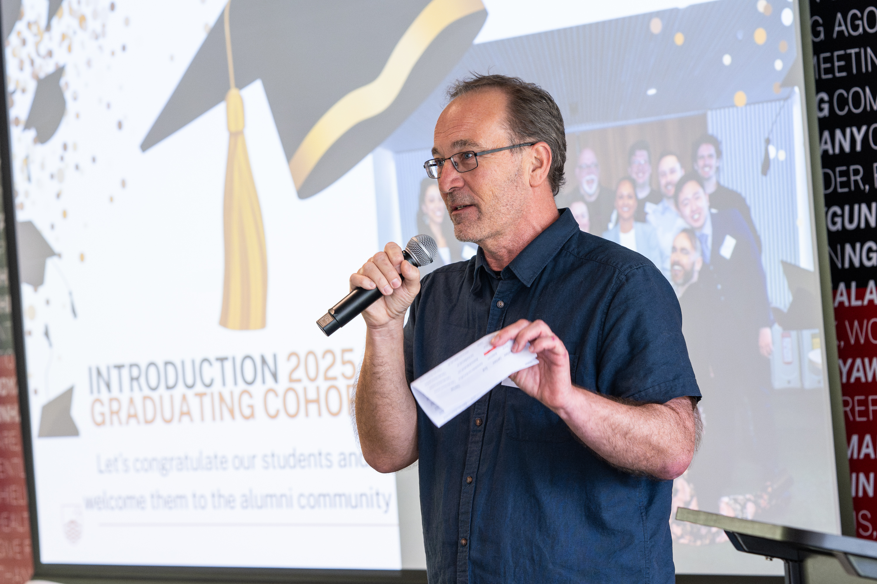 Associate Professor Ash Lenton welcomes the graduating Master of Applied Cybernetics Students into the alumni community