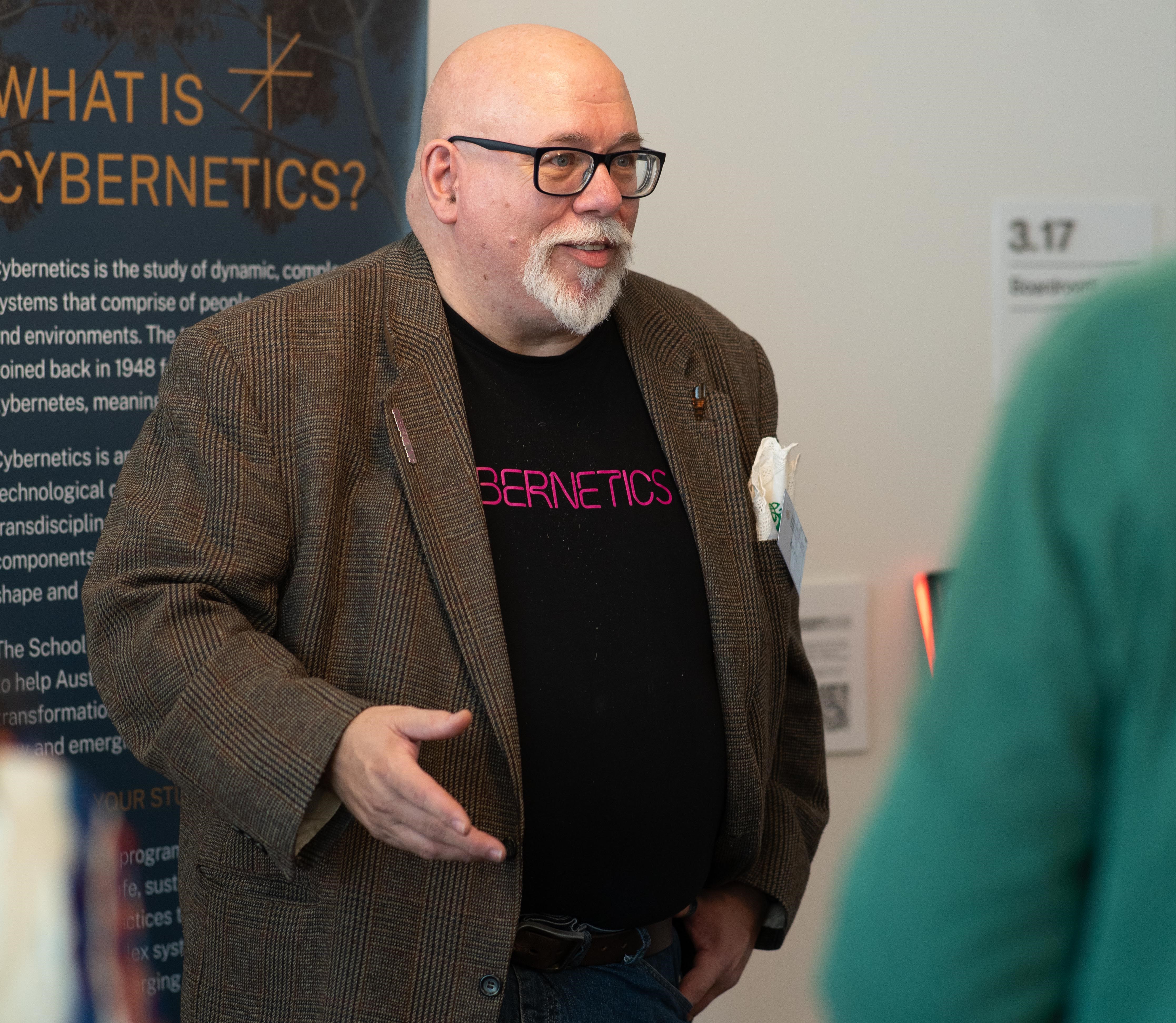 Kevin showcases Fog Staff to a community member